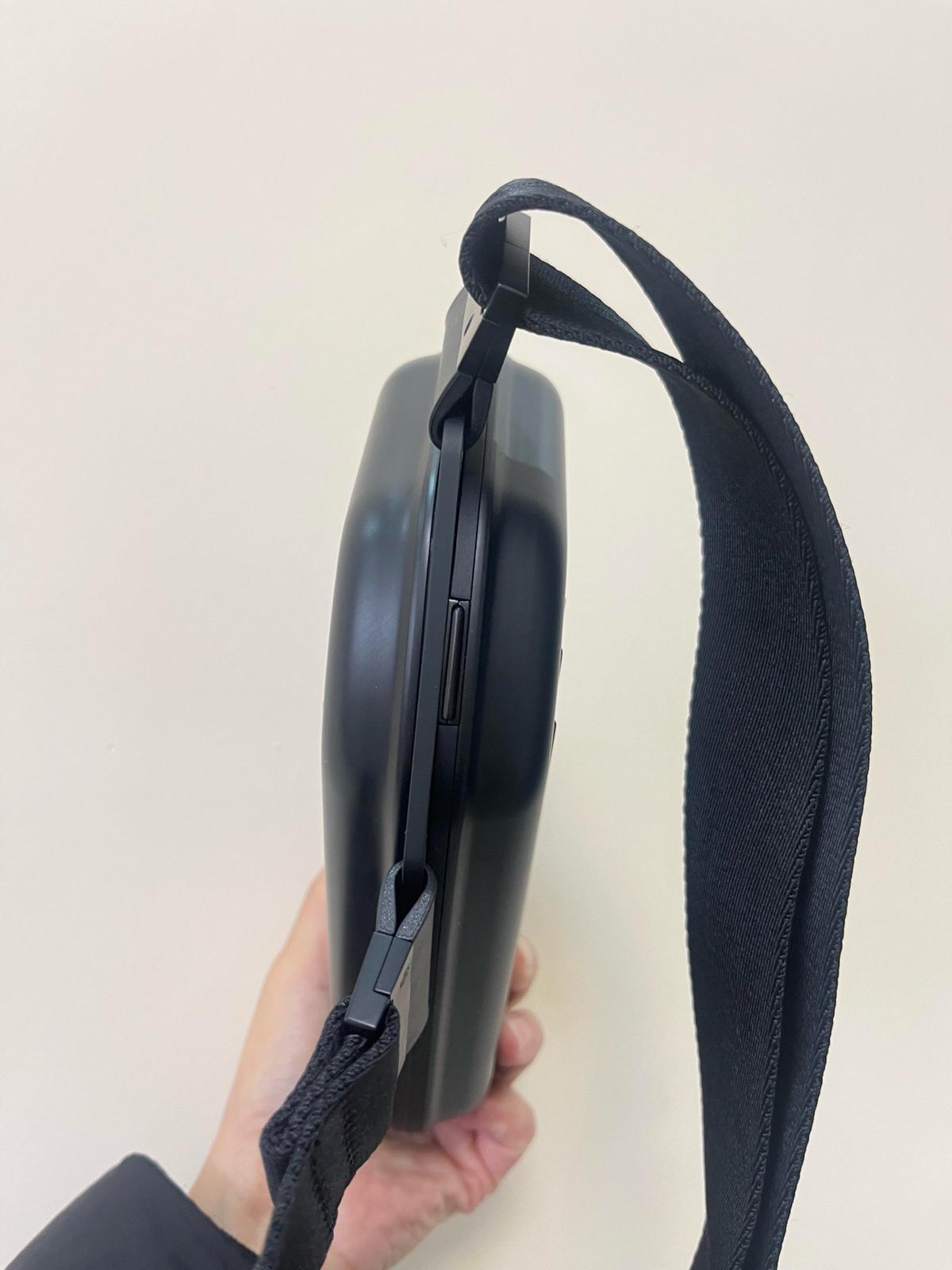 The RIMOWA Aluminum Logo Sling Clutch