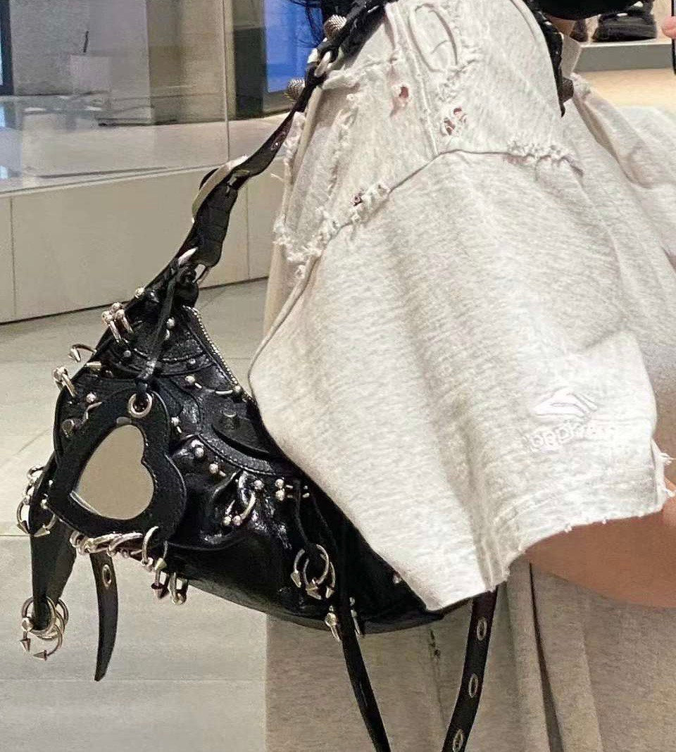 BALENCIAGA LE CAGOLE XS Shoulder Bag With Piercings In Black