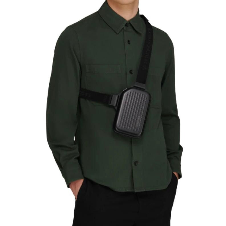 The RIMOWA Aluminum Logo Sling Clutch