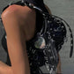BALENCIAGA LE CAGOLE XS Shoulder Bag With Piercings In Black