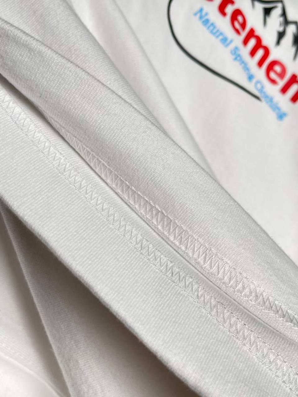 VETEMENTS White Spring Water Logo T-shirt